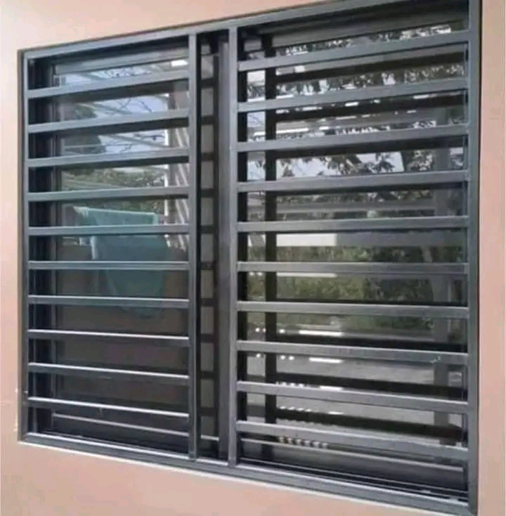 Full-width steel burglar bars fitted over a sliding glass door